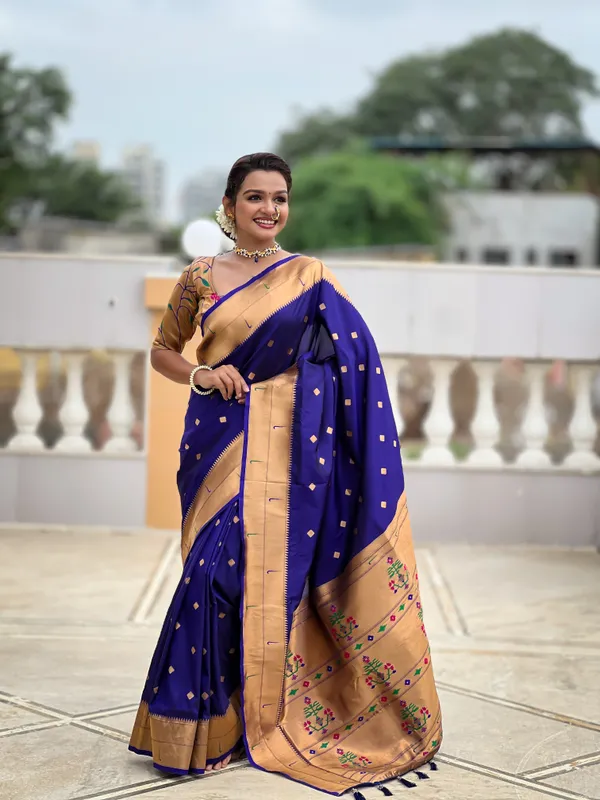Navy_Blue_Soft_Pethani_Silk_Saree_With_Zari_Weaving_Motifs_Design_And_Meenakari_Weaving_Rich_Pallu_With_Meenakari_Weaving_Double_Munia_Border_And_Tassels_Attached_At_Pallu_End_Blouse_For_Women
