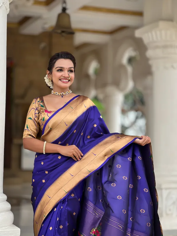 Navy_Blue_Soft_Pethani_Silk_Saree_With_Zari_Weaving_Motifs_Design_And_Meenakari_Weaving_Rich_Pallu_With_Meenakari_Weaving_Double_Munia_Border_And_Tassels_Attached_At_Pallu_End_Blouse_For_Women