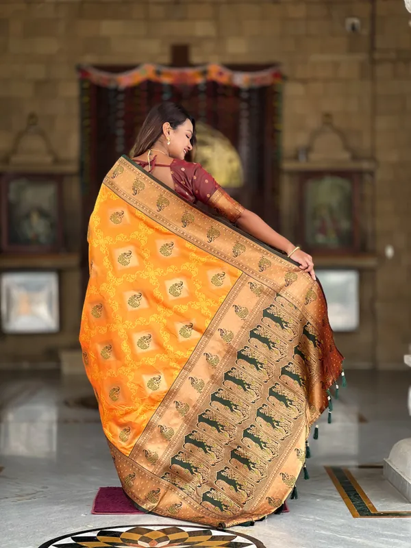 Mustard_Soft_Banarasi_Silk_Saree_With_Zari_Weaving_Meenakari_Design_All_Over_The_Saree_And_Contrast_Weaving_Rich_Pallu_With_Contrast_Weaving_Border_And_Tassels_Attached_At_Pallu_And_Blouse_For_Women
