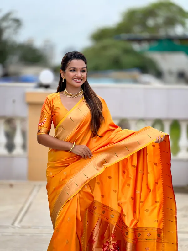 Orange_Soft_Pethani_Silk_Saree_With_Zari_Weaving_Motifs_Design_And_Meenakari_Weaving_Rich_Pallu_With_Meenakari_Weaving_Munia_Border_And_Tassels_Attached_At_Pallu_End_Blouse_For_Women