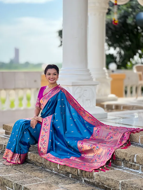 Firozi_Soft_Pethani_Silk_Saree_With_Zari_Weaving_Motifs_Design_And_Meenakari_Weaving_Rich_Pallu_With_Meenakari_Weaving_Border_And_Tassels_Attached_At_Pallu_End_Blouse_For_Women