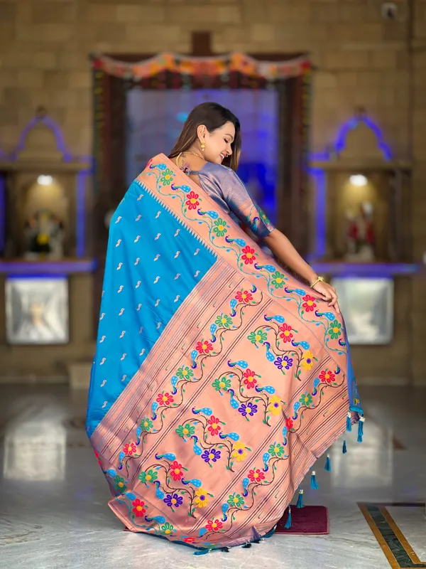 Sky_Blue_Soft_Paithani_Silk_Saree_With_Zari_Weaving_Meenakari_Motifs_Design_And_Meenakari_Weaving_Rich_Pallu_With_Meenakari_Weaving_Border_And_Tassels_Attached_At_Pallu_And_Blouse_For_Women