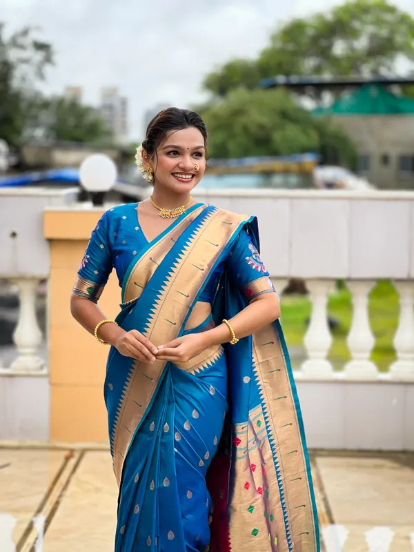 Firozi_Soft_Pethani_Silk_Saree_With_Zari_Weaving_Motifs_Design_And_Meenakari_Weaving_Rich_Pallu_With_Meenakari_Weaving_Munia_Border_And_Tassels_Attached_At_Pallu_End_Blouse_For_Women