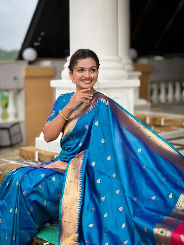 Firozi_Soft_Pethani_Silk_Saree_With_Zari_Weaving_Motifs_Design_And_Meenakari_Weaving_Rich_Pallu_With_Meenakari_Weaving_Munia_Border_And_Tassels_Attached_At_Pallu_End_Blouse_For_Women