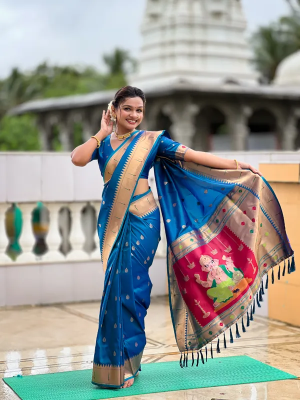 Firozi_Soft_Pethani_Silk_Saree_With_Zari_Weaving_Motifs_Design_And_Meenakari_Weaving_Rich_Pallu_With_Meenakari_Weaving_Munia_Border_And_Tassels_Attached_At_Pallu_End_Blouse_For_Women