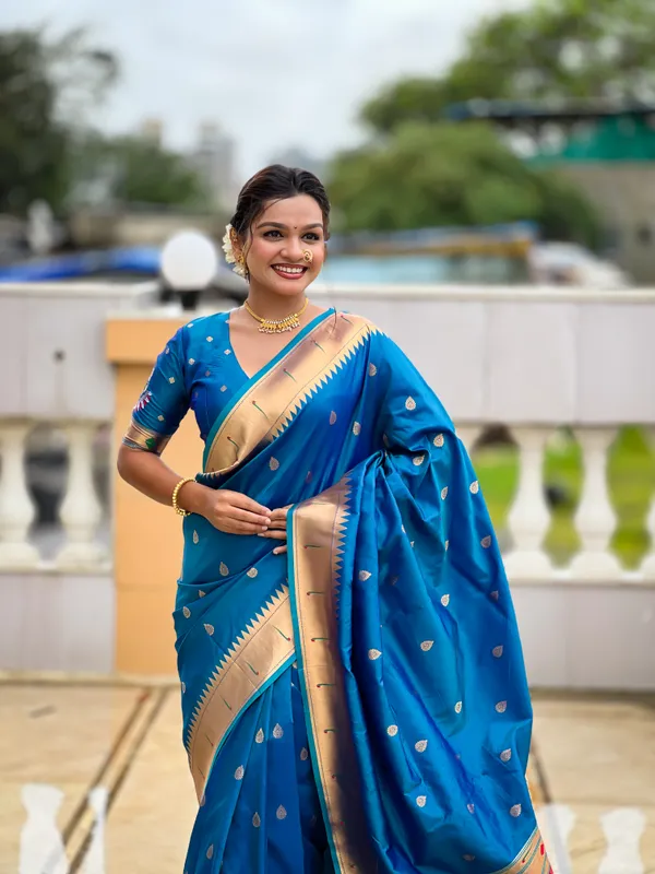 Firozi_Soft_Pethani_Silk_Saree_With_Zari_Weaving_Motifs_Design_And_Meenakari_Weaving_Rich_Pallu_With_Meenakari_Weaving_Munia_Border_And_Tassels_Attached_At_Pallu_End_Blouse_For_Women