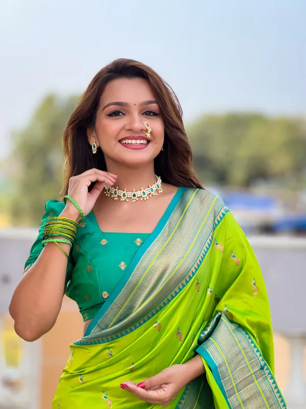 Parrot_Green_Soft_Pethani_Silk_Saree_With_Zari_Weaving_Motifs_Design_And_Meenakari_Weaving_Rich_Pallu_With_Meenakari_Weaving_Border_And_Tassels_Attached_At_Pallu_End_Blouse_For_Women