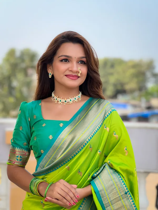 Parrot_Green_Soft_Pethani_Silk_Saree_With_Zari_Weaving_Motifs_Design_And_Meenakari_Weaving_Rich_Pallu_With_Meenakari_Weaving_Border_And_Tassels_Attached_At_Pallu_End_Blouse_For_Women