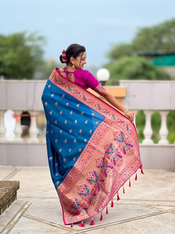 Sky_Blue_Soft_Pethani_Silk_Saree_With_Zari_Weaving_Motifs_Design_And_Meenakari_Weaving_Rich_Pallu_With_Meenakari_Weaving_Border_And_Tassels_Attached_At_Pallu_End_Blouse_For_Women