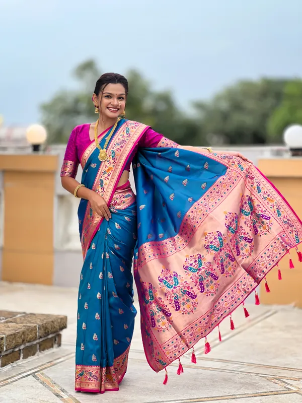 Sky_Blue_Soft_Pethani_Silk_Saree_With_Zari_Weaving_Motifs_Design_And_Meenakari_Weaving_Rich_Pallu_With_Meenakari_Weaving_Border_And_Tassels_Attached_At_Pallu_End_Blouse_For_Women