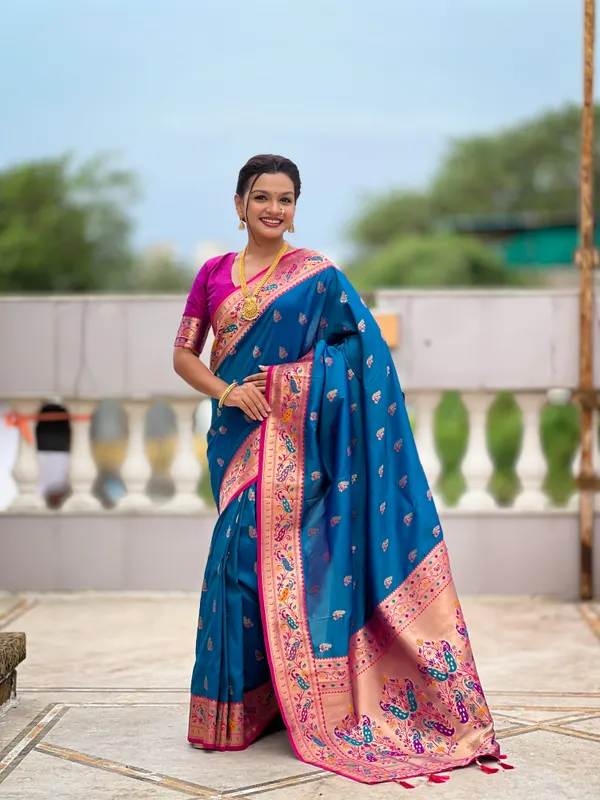 Sky_Blue_Soft_Pethani_Silk_Saree_With_Zari_Weaving_Motifs_Design_And_Meenakari_Weaving_Rich_Pallu_With_Meenakari_Weaving_Border_And_Tassels_Attached_At_Pallu_End_Blouse_For_Women