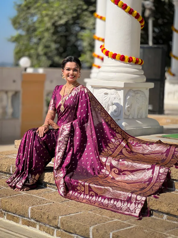 Wine_Soft_Banarasi_Silk_Saree_With_Zari_Weaving_Design_All_Over_The_Saree_And_Zari_Weaving_Rich_Pallu_With_Meenakari_Weaving_Border_And_Tassels_Attached_At_Pallu_End_Blouse_For_Women