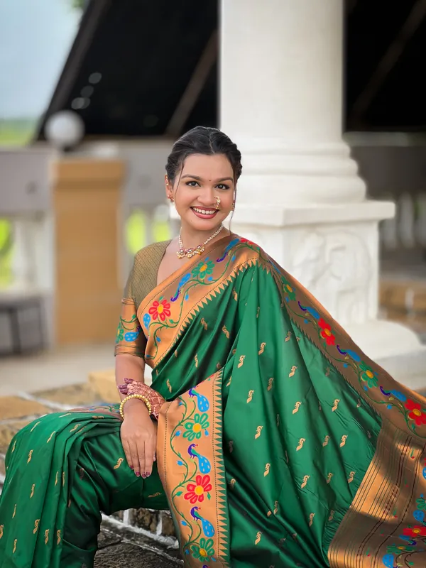 Green_Soft_Paithani_Silk_Saree_With_Zari_Weaving_Meenakari_Motifs_Design_And_Meenakari_Weaving_Rich_Pallu_With_Meenakari_Weaving_Border_And_Tassels_Attached_At_Pallu_And_Blouse_For_Women