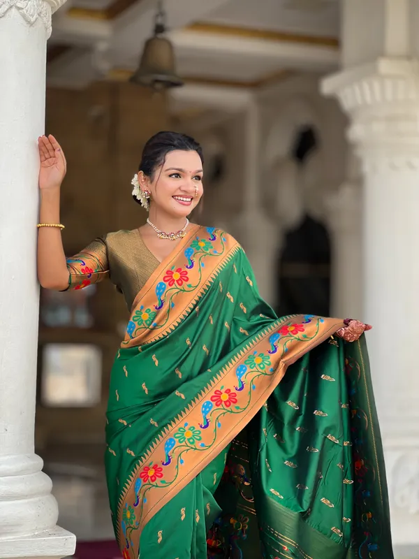 Green_Soft_Paithani_Silk_Saree_With_Zari_Weaving_Meenakari_Motifs_Design_And_Meenakari_Weaving_Rich_Pallu_With_Meenakari_Weaving_Border_And_Tassels_Attached_At_Pallu_And_Blouse_For_Women