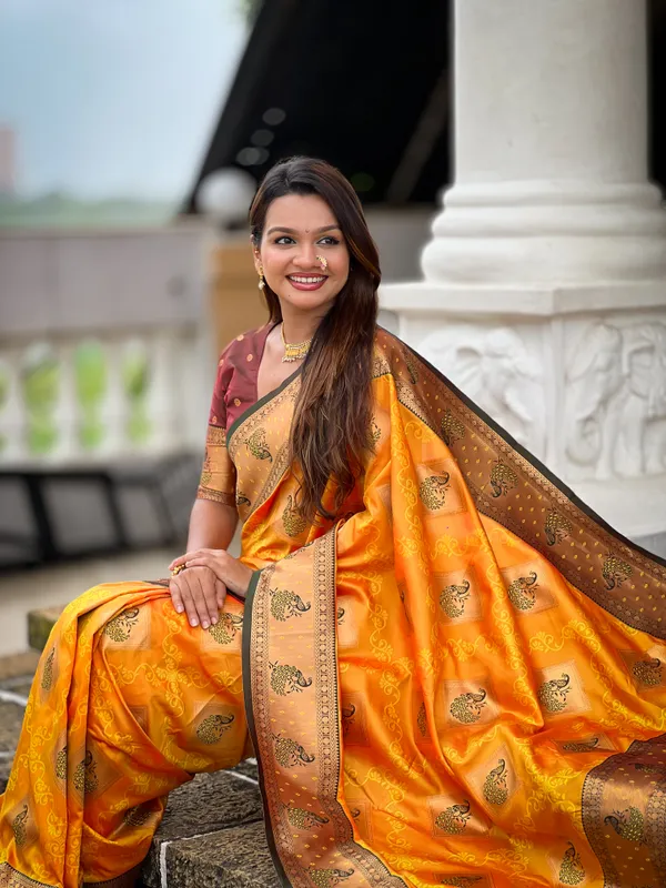 Mustard_Soft_Banarasi_Silk_Saree_With_Zari_Weaving_Meenakari_Design_All_Over_The_Saree_And_Contrast_Weaving_Rich_Pallu_With_Contrast_Weaving_Border_And_Tassels_Attached_At_Pallu_And_Blouse_For_Women