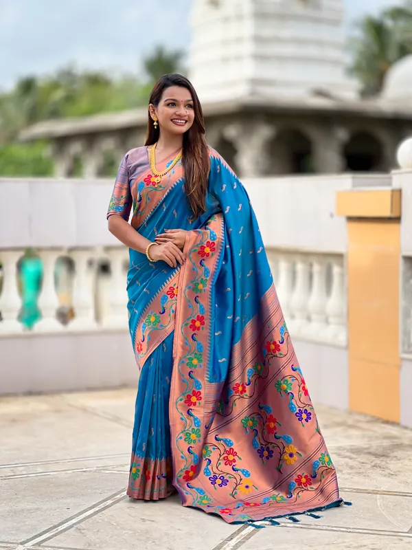 Sky_Blue_Soft_Paithani_Silk_Saree_With_Zari_Weaving_Meenakari_Motifs_Design_And_Meenakari_Weaving_Rich_Pallu_With_Meenakari_Weaving_Border_And_Tassels_Attached_At_Pallu_And_Blouse_For_Women
