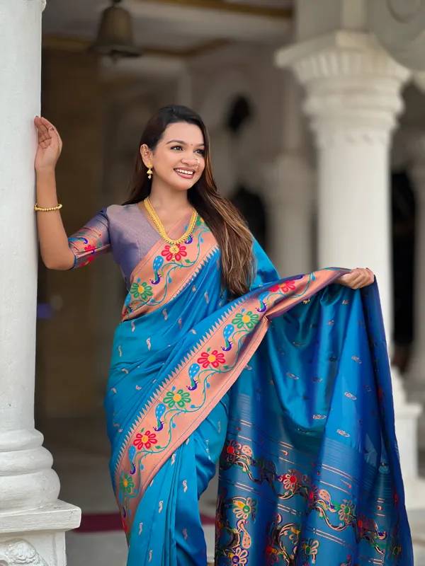 Sky_Blue_Soft_Paithani_Silk_Saree_With_Zari_Weaving_Meenakari_Motifs_Design_And_Meenakari_Weaving_Rich_Pallu_With_Meenakari_Weaving_Border_And_Tassels_Attached_At_Pallu_And_Blouse_For_Women