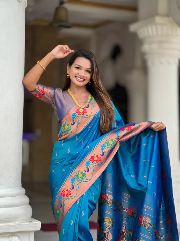 Sky_Blue_Soft_Paithani_Silk_Saree_With_Zari_Weaving_Meenakari_Motifs_Design_And_Meenakari_Weaving_Rich_Pallu_With_Meenakari_Weaving_Border_And_Tassels_Attached_At_Pallu_And_Blouse_For_Women