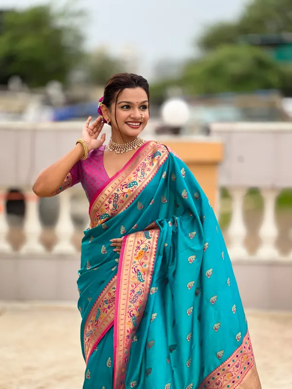 Firozi_Soft_Pethani_Silk_Saree_With_Zari_Weaving_Motifs_Design_And_Meenakari_Weaving_Rich_Pallu_With_Meenakari_Weaving_Border_And_Tassels_Attached_At_Pallu_End_Blouse_For_Women