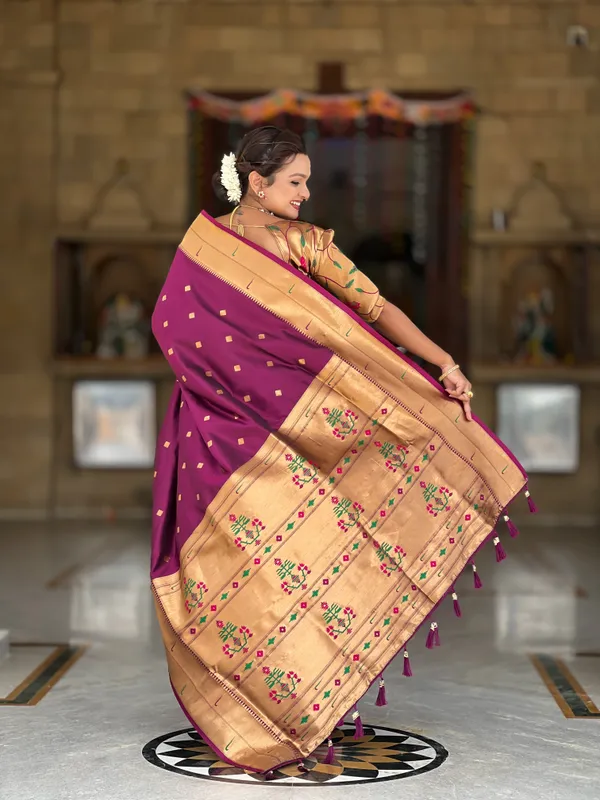 Wine_Soft_Pethani_Silk_Saree_With_Zari_Weaving_Motifs_Design_And_Meenakari_Weaving_Rich_Pallu_With_Meenakari_Weaving_Double_Munia_Border_And_Tassels_Attached_At_Pallu_End_Blouse_For_Women
