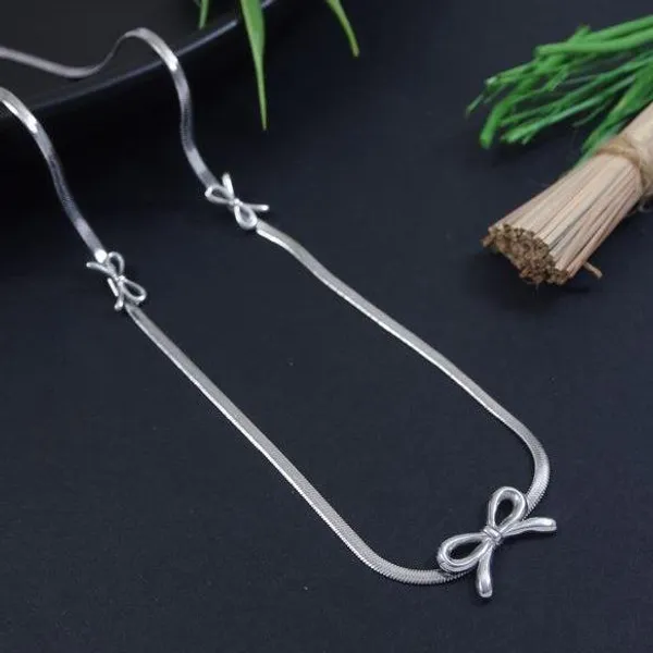 Decorative_Metal_Towel_Bar_With_Bow_Ends_-_Silver_Finish_Wall_Mount_Hanger