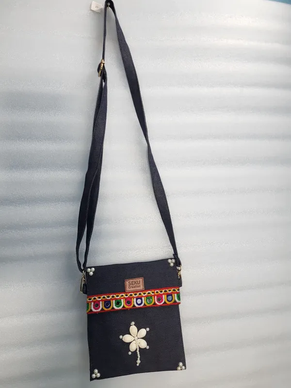 Navy_Blue_Denim_Crossbody_Bag_With_Floral_Embellishments