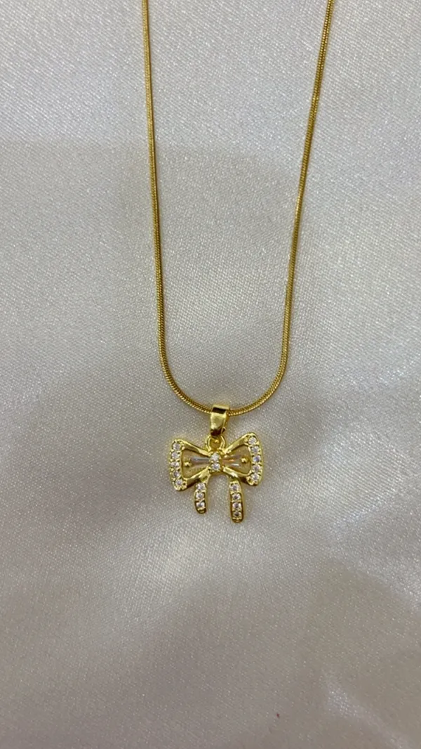 Golden_Crystal_Bow_Charm_Necklace_For_Women_And_Girls