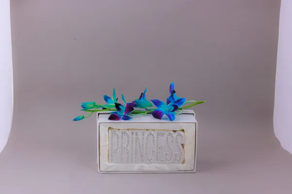 Blue_Orchid_Flower_Arrangement_In_White_Ceramic_Planter