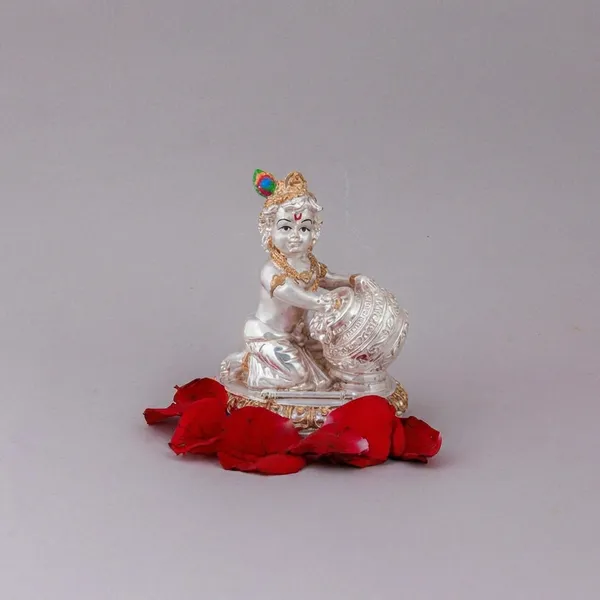Decorative_White_And_Gold_Goddess_Figurine_With_Red_Ribbon