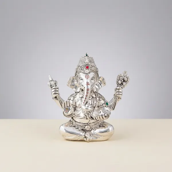New_Ganesha_-_Silver_Idol_With_Blue_Orchid_Decoration