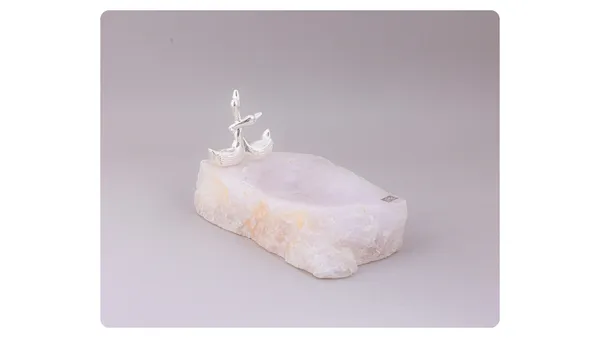 Decorative_White_Stone_Figurine_With_Metal_Accent