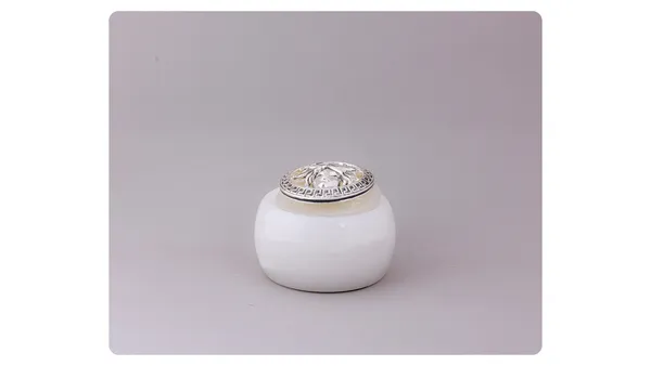 White_Ceramic_Jar_With_Decorative_Silver_Lid
