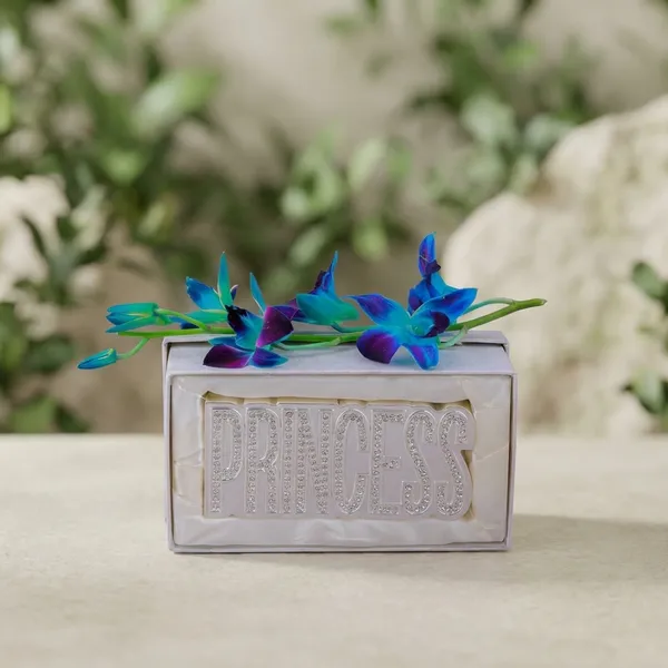 Blue_Orchid_Flower_Arrangement_In_White_Ceramic_Planter