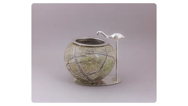 Decorative_Ceramic_Vase_With_Metal_Stand_And_Leaf_Accent