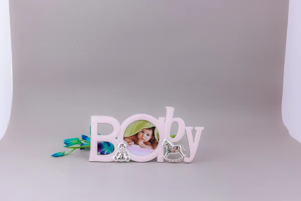 Baby_Photo_Frame_-_Pink_Wooden_Letter_Design_With_Decorative_Accents