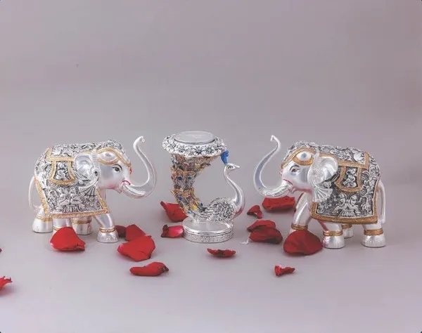 Pair_Of_Elephant_And_Peacock_Tea_-_Silver_Decorative_Figurines