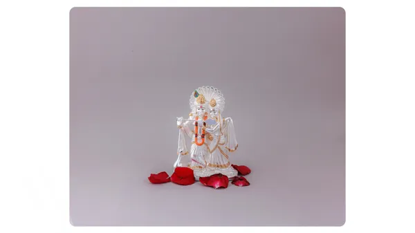 Radha_Krishna_Acrylic_Idol_With_Rose_Petals_-_Decorative_Hindu_Religious_Figurine