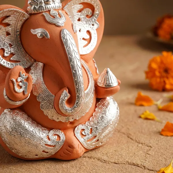 Decorative_Lord_Ganesha_Idol_-_Orange_&_Silver_Finish