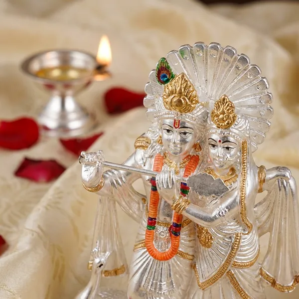 Radha_Krishna_Acrylic_Idol_With_Rose_Petals_-_Decorative_Hindu_Religious_Figurine