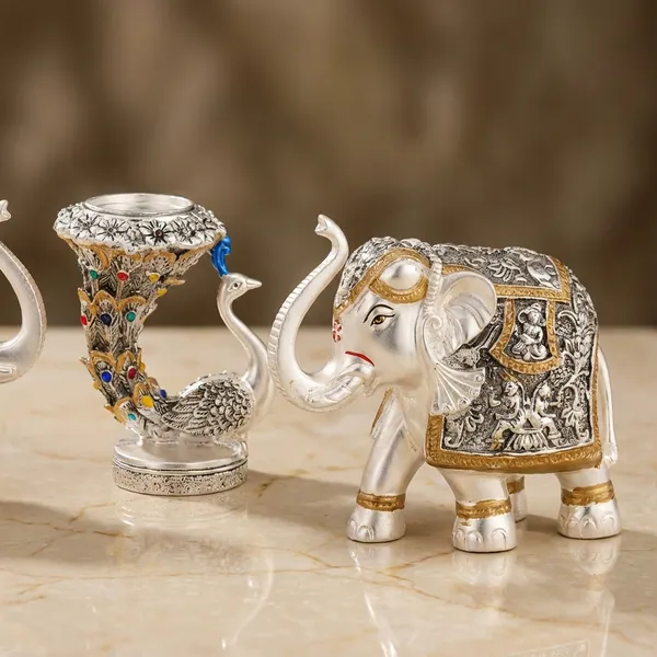 Decorative_Elephant_Figurines_Set_With_Floral_Embellishments_And_Vase