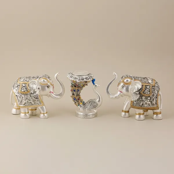 Decorative_Elephant_Figurines_Set_With_Floral_Embellishments_And_Vase