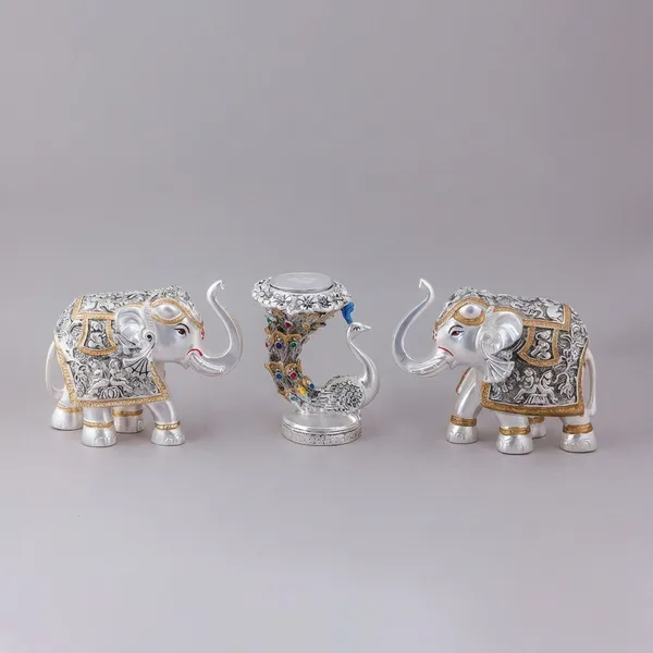 Pair_Of_Elephant_And_Peacock_Tea_-_Silver_Decorative_Figurines