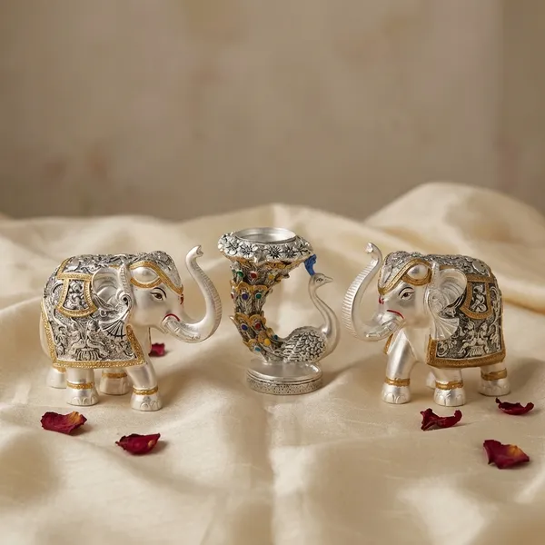 Pair_Of_Elephant_And_Peacock_Tea_-_Silver_Decorative_Figurines