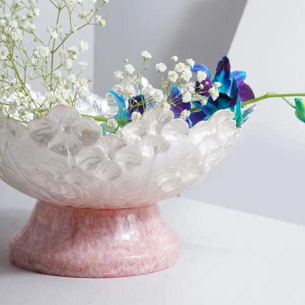 Decorative_Floral_Arrangement_In_Pink_Glass_Vase