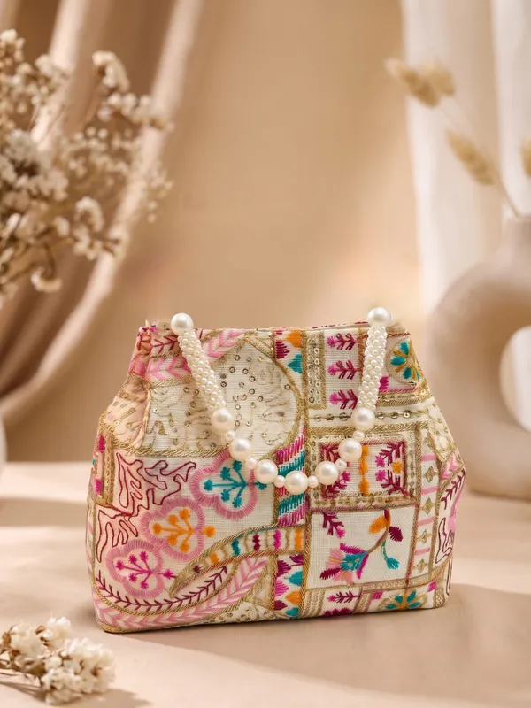Elegant_Floral_embroidery_bag_&_Ethnic_clutch_with_Pearl_Beaded_Handle