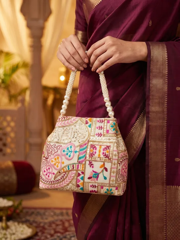 Elegant_Floral_embroidery_bag_&_Ethnic_clutch_with_Pearl_Beaded_Handle
