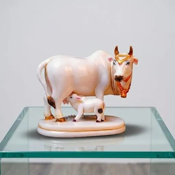 Earthen_Handcrafted_Kamadhenu_Cow_And_Calf_Idol_Religious_Mother_Cow_Gau_Mata_Statue_For_Home_Decor_Office_Gift_Premium_White_Gold_Finish_Vastu_Decorative_Showpiece_9cm