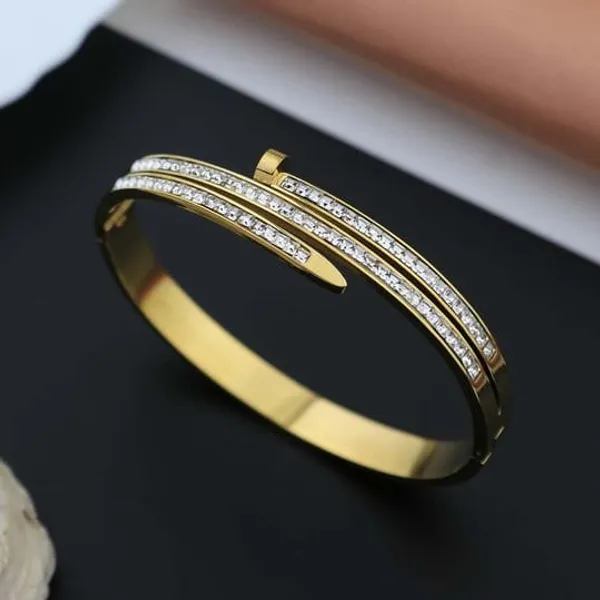 Gold_Tone_Nail_Bangle_Bracelet_With_Crystal_Embellishments_For_Women