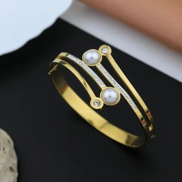 Elegant_Gold_Tone_Bangle_With_Pearl_And_Crystal_Accents_For_Women