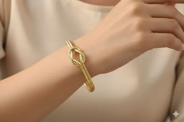 Elegant_Gold_Tone_Knot_Bangle_Bracelet_For_Women